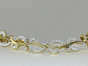 На фото Золотые браслеты в Казахстане №789: Красное золото Au585 Родирование Фианит  Платина.
