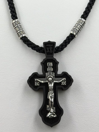 На фото Золотые кресты в Казахстане №крестик из серебристый с деревоом вес 19.67 г:     .