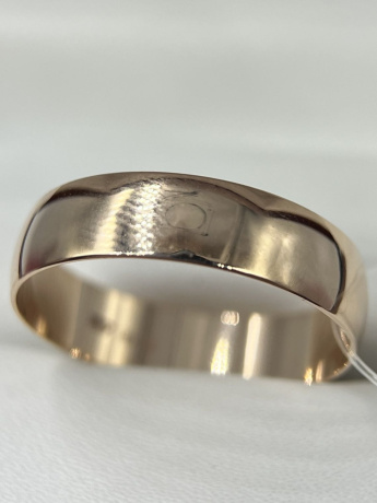 На фото Золотые кольца в Казахстане №обручальное кольцо из красного золота без вставки 22.5 вес 4.06 г:     .