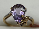 На фото Золотые кольца в Казахстане №кольцо из красного золота с аметистом и фианитом 16.5 вес 2.66 г:     .