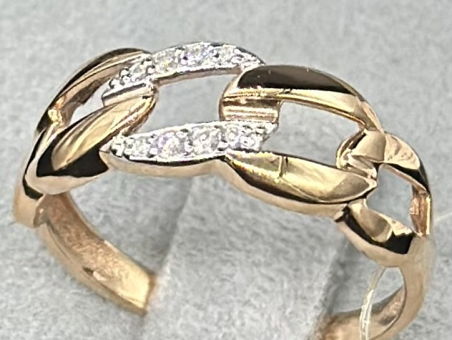 На фото Золотые кольца в Казахстане №кольцо из красного золота с фианитом 16.5 вес 1.65 г:     .