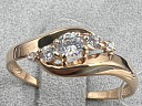 На фото Золотые кольца в Казахстане №кольцо из красного золота с фианитом 17.5 вес 1.25 г:     .