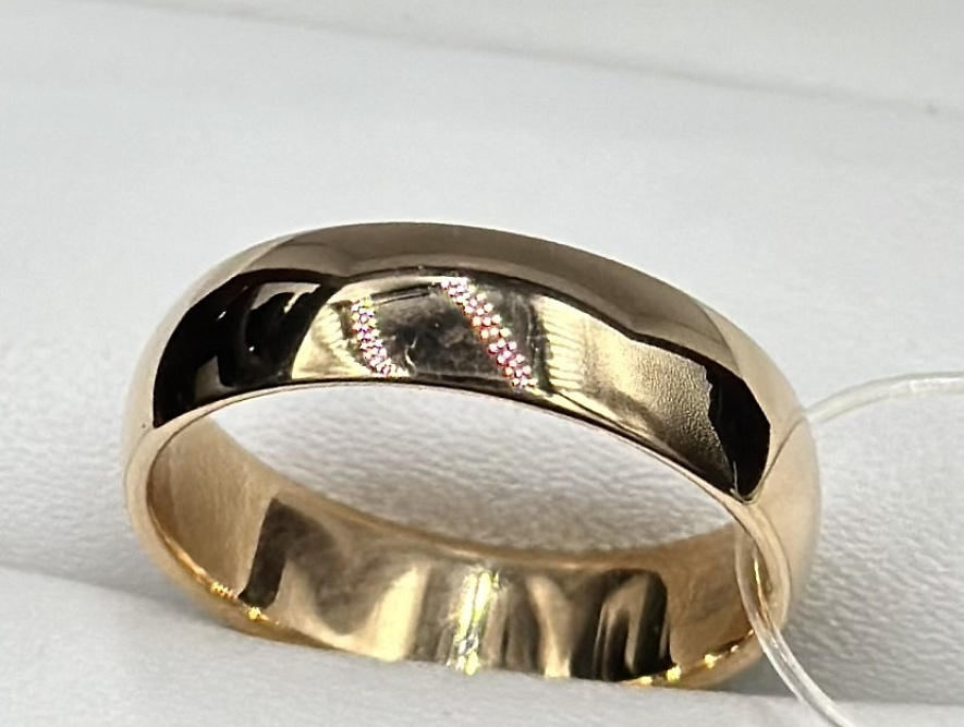 На фото Золотые кольца в Казахстане №обручальное кольцо из красного золота без вставки 16.5 вес 3.59 г:     .