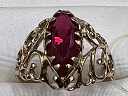 На фото Золотые кольца в Казахстане №кольцо из красного золота с рубином 20 вес 3.89 г:     .