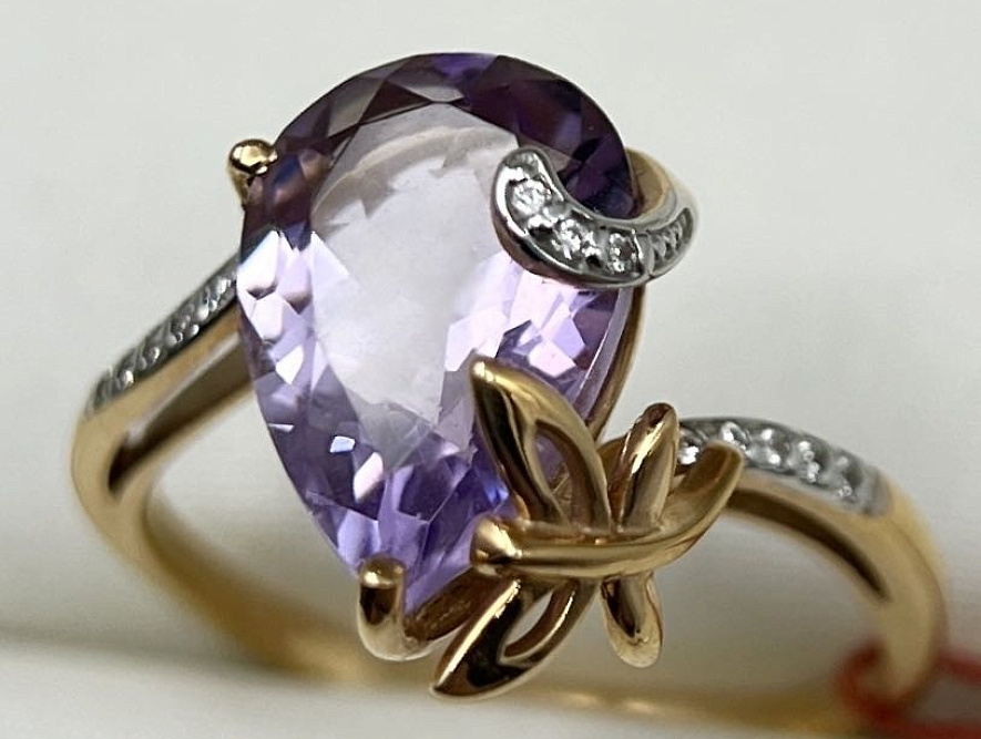 На фото Золотые кольца в Казахстане №кольцо из красного золота с аметистом и фианитом 16.5 вес 2.66 г:     .