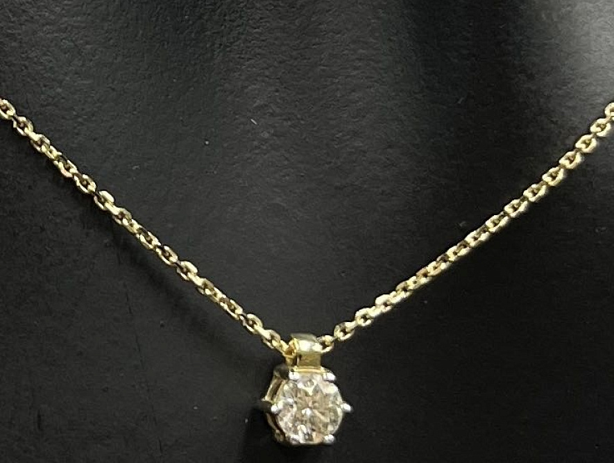 На фото Золотые колье в Казахстане №колье из желтого золота с бриллиантом вес 1.98 г:     .