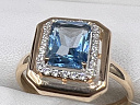На фото Золотые кольца в Казахстане №кольцо из красного золота с фианитом и топазом 18.5 вес 2.67 г:     .