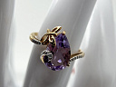На фото Золотые кольца в Казахстане №кольцо из красного золота с аметистом и фианитом 16.5 вес 2.66 г:     .