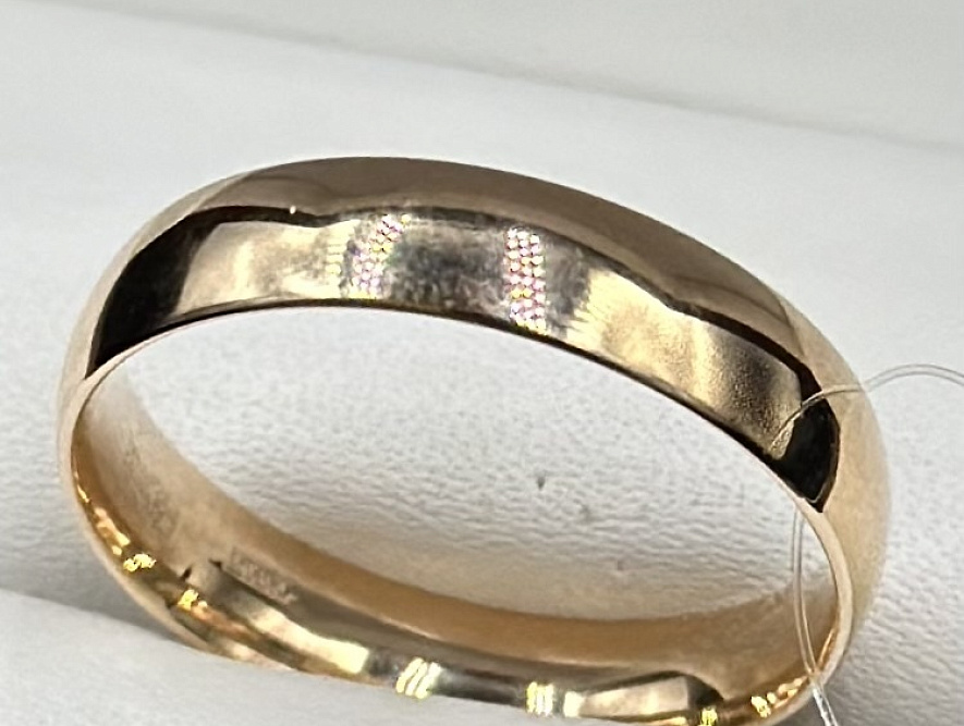 На фото Золотые кольца в Казахстане №обручальное кольцо из красного золота без вставки 20 вес 4.38 г:     .