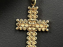 На фото Золотые кресты в Казахстане №крестик из красного золота с бриллиантом вес 3.48 г:     .