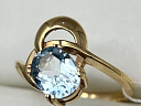 На фото Золотые кольца в Казахстане №кольцо из красного золота с топазом 18 вес 4.02 г:     .