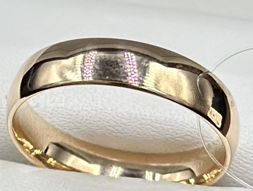 На фото Золотые кольца в Казахстане №обручальное кольцо из красного золота без вставки 18.5 вес 4.07 г:     .