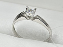 На фото Золотые кольца в Казахстане №помолвочное кольцо из белого золота с фианитом 17.5 вес 1.86 г:     .