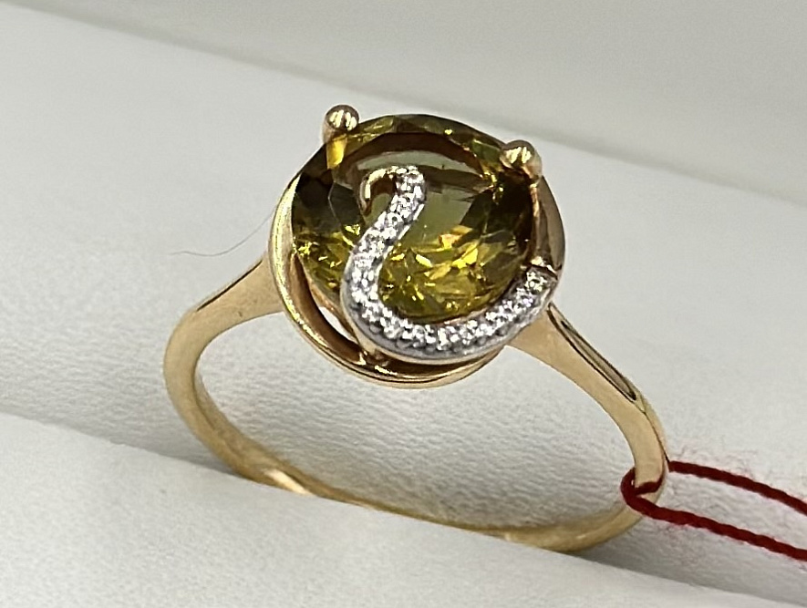 На фото Золотые кольца в Казахстане №кольцо из красного золота с фианитом и александритом 18 вес 2.87 г:     .