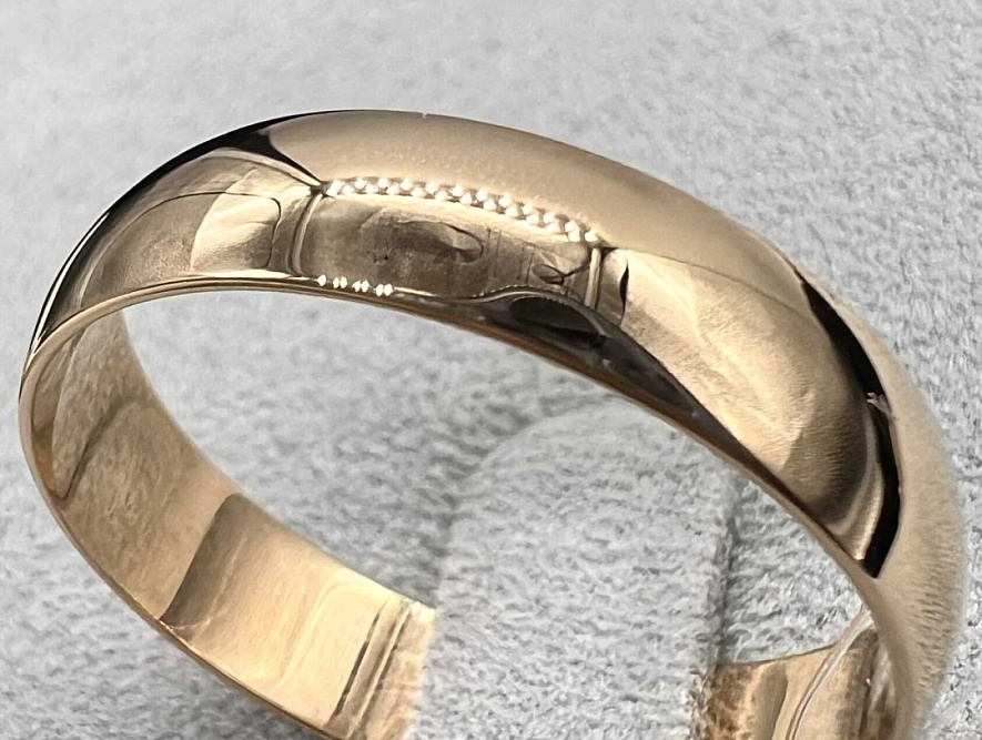 На фото Золотые кольца в Казахстане №обручальное кольцо из красного золота без вставки 20 вес 3.26 г:     .