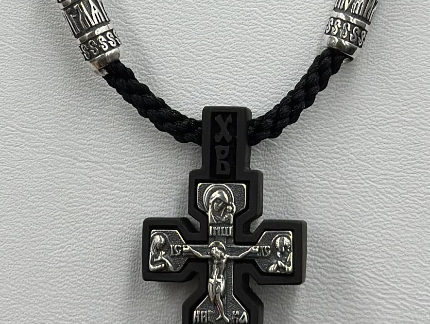 На фото Золотые кресты в Казахстане №крестик из серебристый с деревоом вес 10.11 г:     .