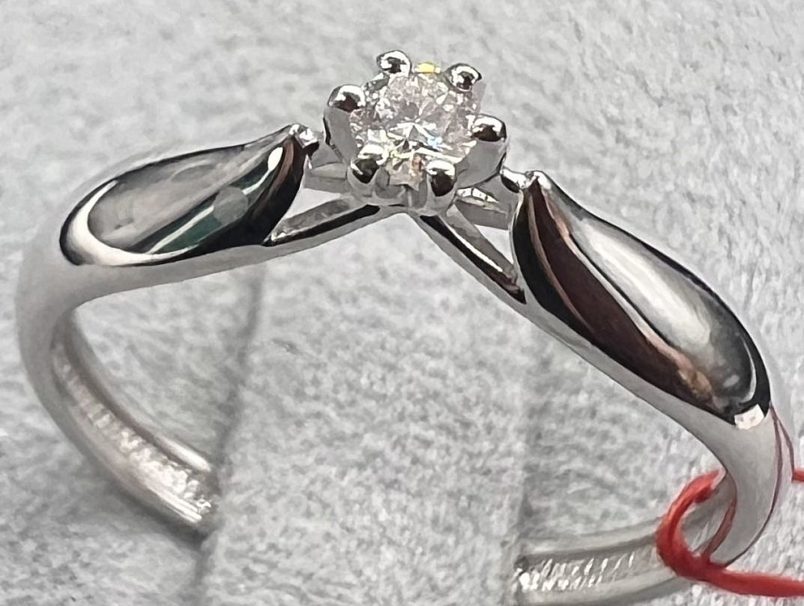 На фото Золотые кольца в Казахстане №кольцо из белого золота с бриллиантом 16.5 вес 1.49 г:     .