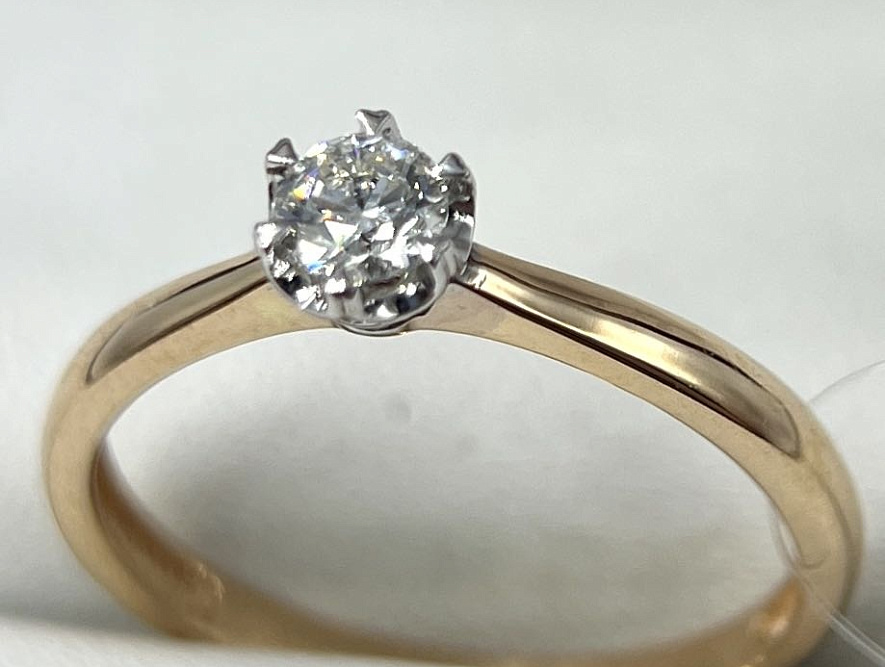 На фото Золотые кольца в Казахстане №кольцо из белого золота с бриллиантом 16.5 вес 1.49 г:     .