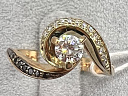 На фото Золотые кольца в Казахстане №кольцо из красного золота с бриллиантом 16 вес 3.52 г:     .