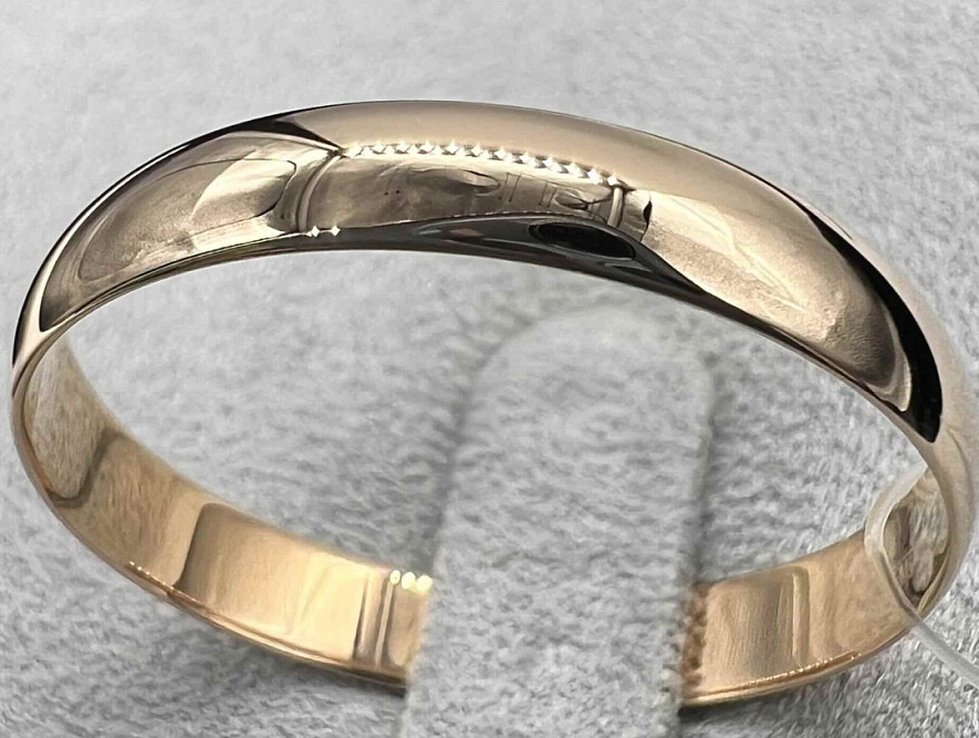 На фото Золотые кольца в Казахстане №обручальное кольцо из красного золота без вставки 22 вес 2.52 г:     .