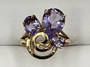 На фото Золотые кольца в Казахстане №кольцо из красного золота с аметистом 17.5 вес 3.46 г:     .
